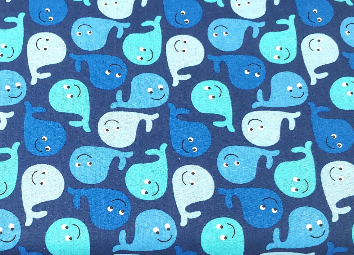 Tossed Whales on Blue